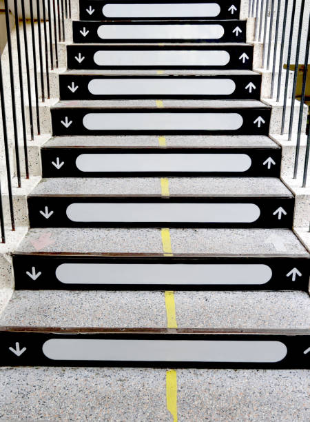 istock Stairs from ground floor upward with empty space for message 1435768052
