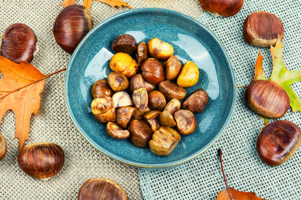 istock Peeled roasted chestnuts, appetizing dessert. 1435768369