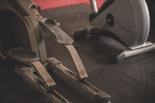 Old exercise machine in gym