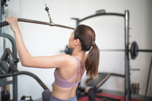 woman lat pulldown back exercise ripl fitness
