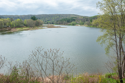 View of the Upper Delaware River in Narrowsburg, NY. The Upper Delaware River stretches along approximately 73.4 miles (118.1 km) of the Delaware River from Hancock, New York to Sparrowbush, New York on the border between New York and Pennsylvania. It includes parts of five counties along this section of the river: Delaware County, Orange County, and Sullivan County in New York and Pike County and Wayne County in Pennsylvania.