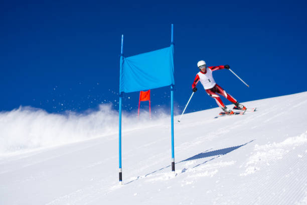 istock Alpine ski racer on giant slalom course blurred in background 1435774858