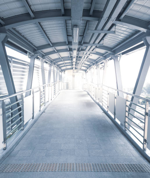 istock Cross over bridge to MRT station 1435776131