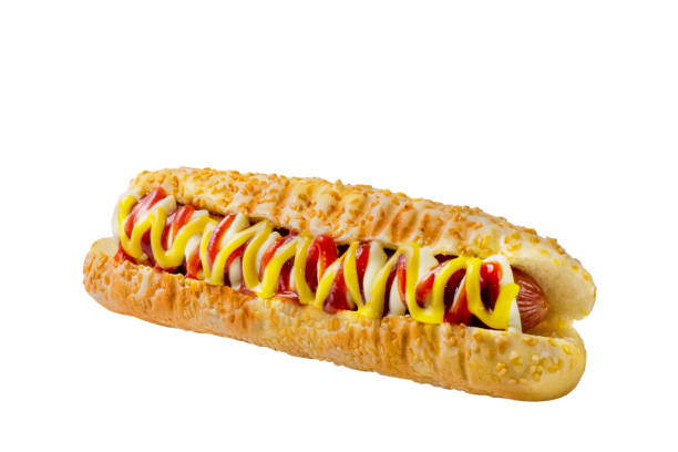 Hot dog garnished with sauces in a white bun stock photo