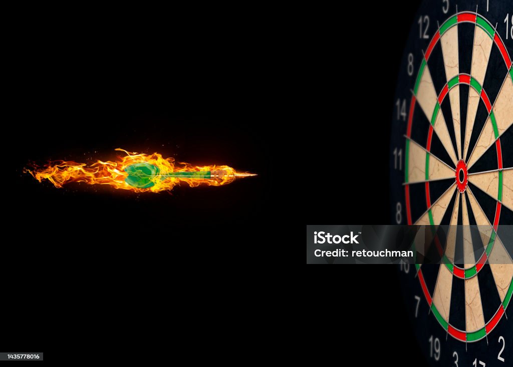 Darts, on fire flying to the target Darts Stock Photo