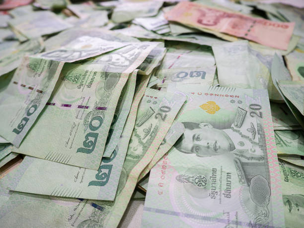 istock Closeup of many Thai Banknote background. 1435778543