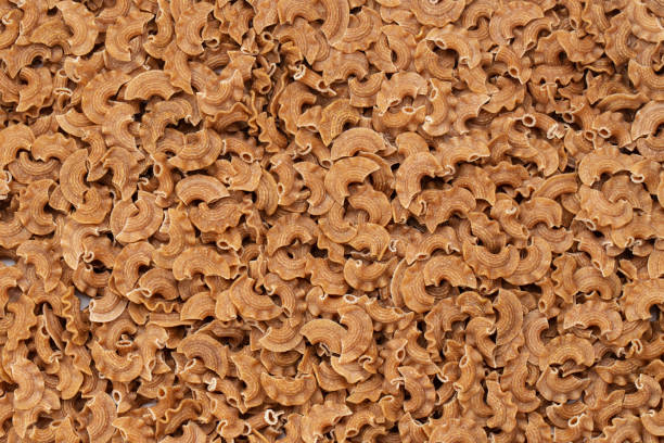 istock Pasta background, raw pasta, italian food. 1435780141
