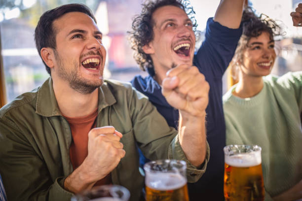 istock Soccer fans celebrating a point 1435780160