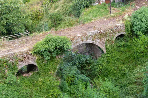 Photo of Dimitsana old three-arch bridge of Makris in Arcadia, Greece