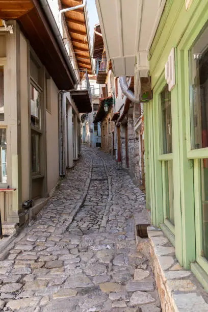Photo of Dimitsana village traditional architecture and paved alleys in Arcadia, Greece