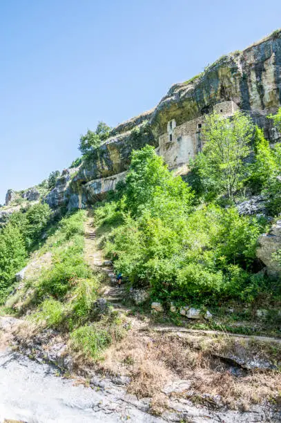 Photo of The panorama of the Hermitage of San Bartolomeo in Legio built with stones and carved into the rock