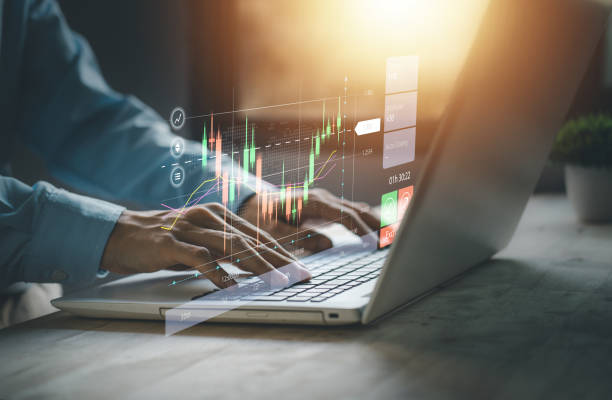 istock Stock chart or cryptocurrency chart with businessman hand typing notebook (Laptop). Statistics graph and char growing graph. Success business concept. 1435795221