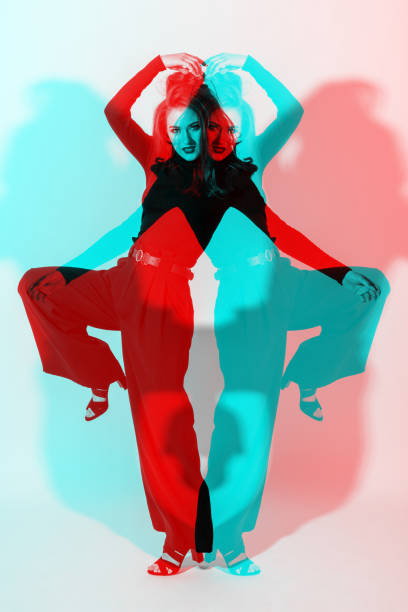 istock Woman with black outfit studio portrait in RGB color split effect style 1435795530