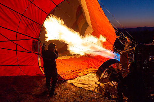 fire to inflate a hot-air balloon