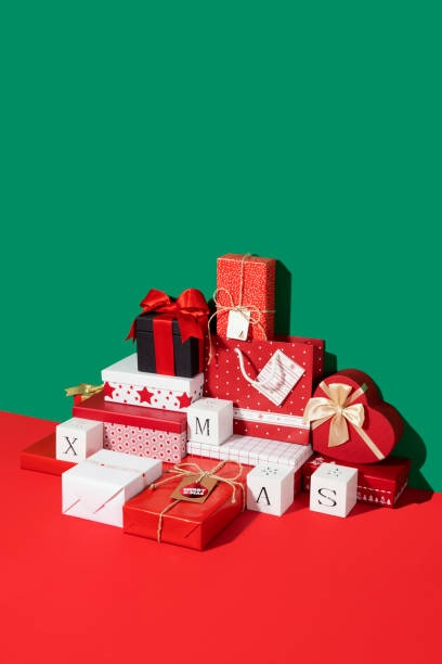 istock Christmas Gift Boxes Organized Neatly on Red and Green Background 1435829966