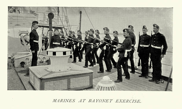 istock British Royal marines at bayonet exercise on deck of warship, 1890s, Victorian 19th Century. 1435830865