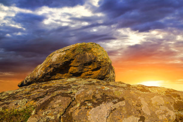 heap of huge stones at the sunset