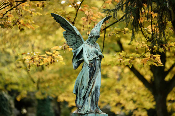 istock angel with wings in a cemetery 1435834268