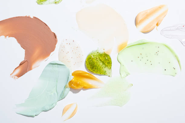 istock Cosmetic creme swatches and smears on light surface 1435842973
