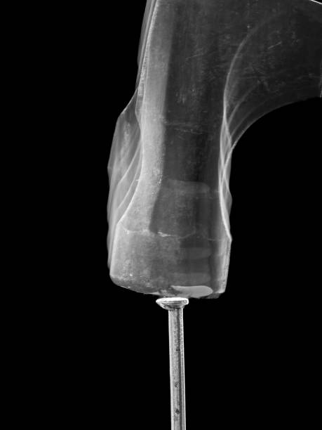istock motion blur of hammer hitting a nail 1435849530