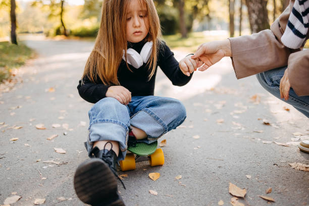 istock Girl is sitting on a skate 1435852642