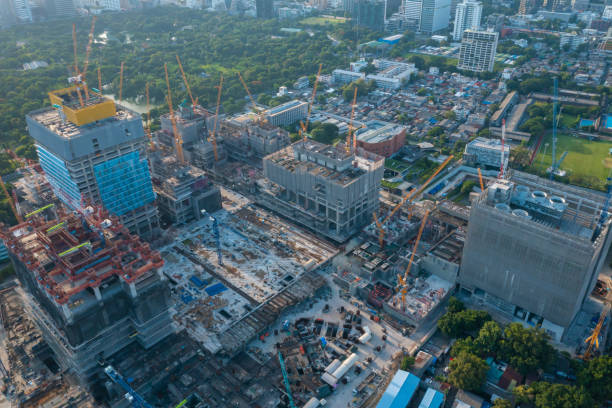 aerial view of construction site with tower crane urban construction rush hour of concrete pouring - foundation claude monet imagens e fotografias de stock