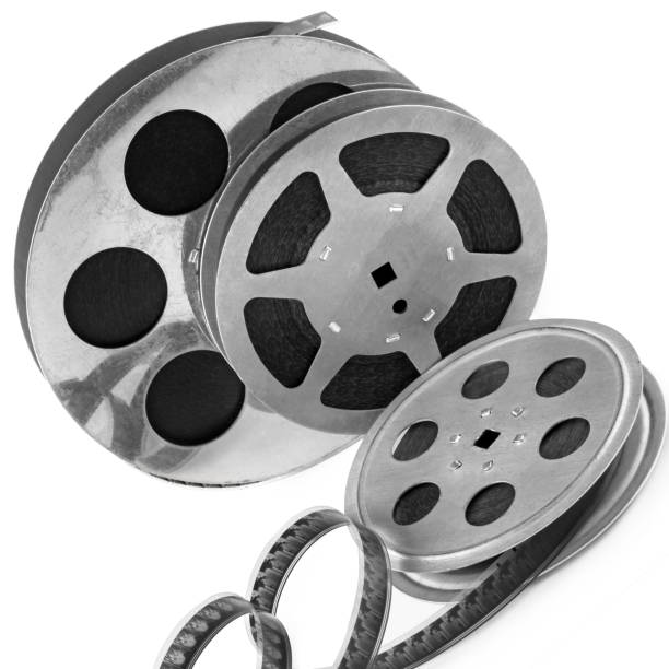 istock A 35mm film in three reels, isolated over white 1435857183