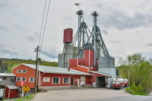 Narrowsburg, New York, United States of America - April 29, 2017. Narrowsburg Feed mill in Narrowsburg, NY. The feed mill is owned by Narrowsburg Feed & Grain Co.
