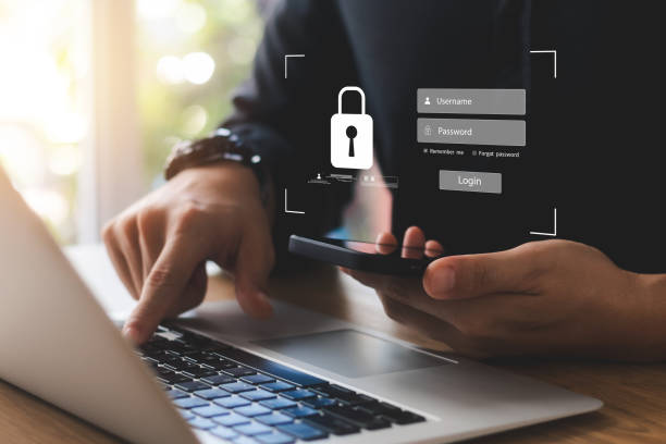 istock Cybersecurity internet and networking concept. Close up of hand holding smartphone information security and encryption, secure access to user's personal information, secure Internet access. 1435860346