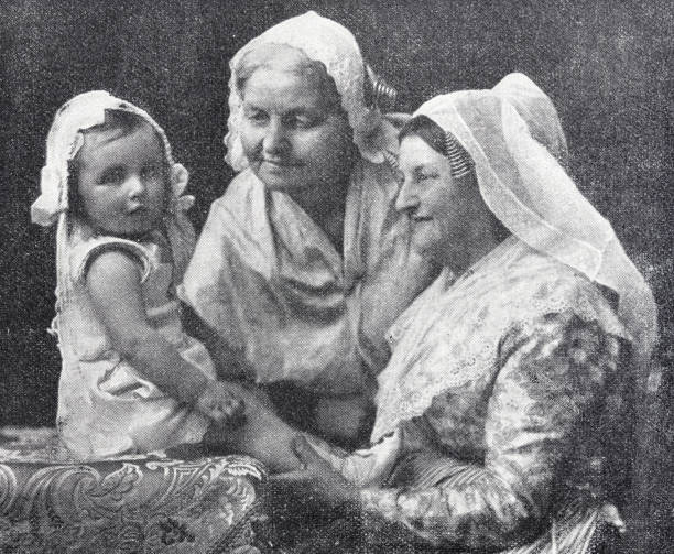 istock The two grandmothers talk to a baby sitting on a table 1435860404