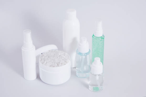 istock Composition of different cosmetic bottles mock-up on gray background 1435862237