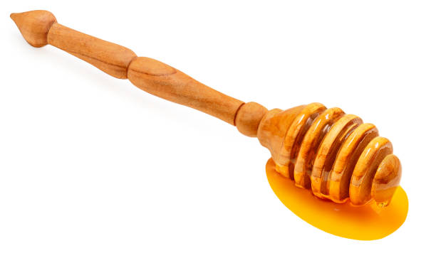 istock Honey dipper stick  isolated on a white background. 1435864159