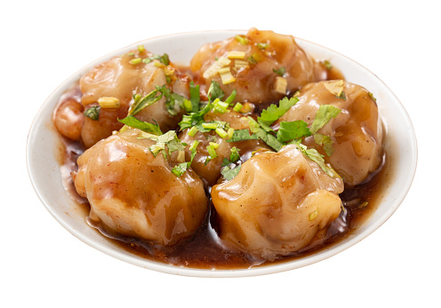 Bawan (Ba wan), Taiwanese meatball delicacy, delicious street food, steamed starch wrapped round shaped dumpling with pork and shrimp inside and thick soy sauce isolated on white bakcground.