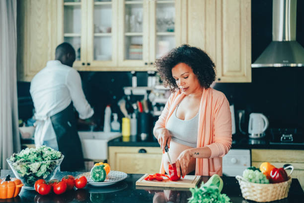 istock Couple cooking together 1435869313