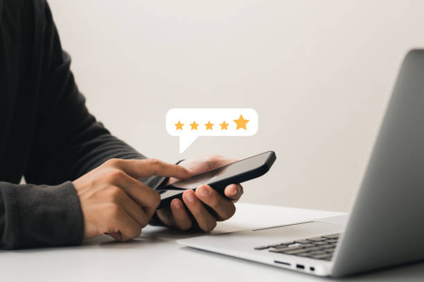 istock User give rating to service experience on online application, Customer review satisfaction feedback survey concept, Customer can evaluate quality of service leading to reputation ranking of business. 1435875013