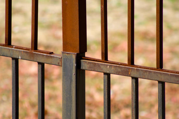 istock Rusty iron railings on top of iron railings 1435875096