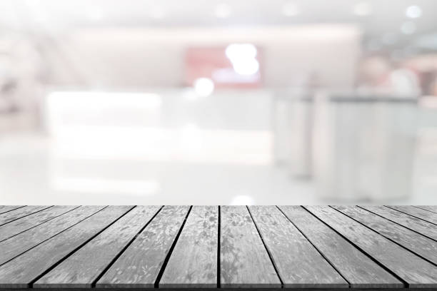 istock Empty wooden board space platform with register counter blurry background 1435875224