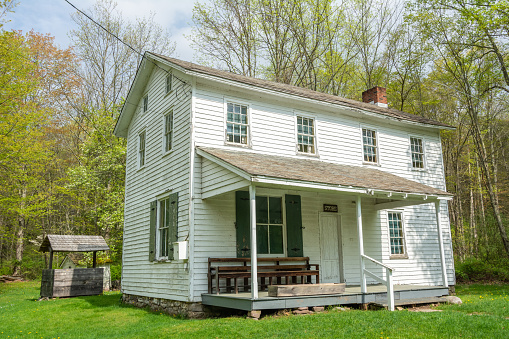 Hardwick, New Jersey, United States of America - May 1, 2017. The General Store at Millbrook Village in Delaware Water Gap, NJ. The village store was vital to the community's economic life. Items the farmers could not grow or make themselves were often obtained at the store. Little cash was available and the storekeeper often bartered with his customers. Customers traded their farm products, hand-produced goods, and services for the hardware, groceries, dry goods, medicines and over 400 other items that filled the shelves. The Post Office was commonly located in the general store. The original Millbrook store was destroyed by fire. This building was moved from the river valley and erected on the site of the original store.