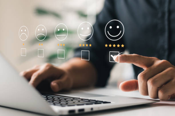 istock User give rating to service experience on online application, Customer review satisfaction feedback survey concept, Customer can evaluate quality of service leading to reputation ranking of business. 1435875451