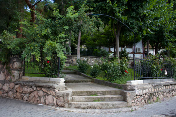 istock Lush garden entrance gate 1435875534