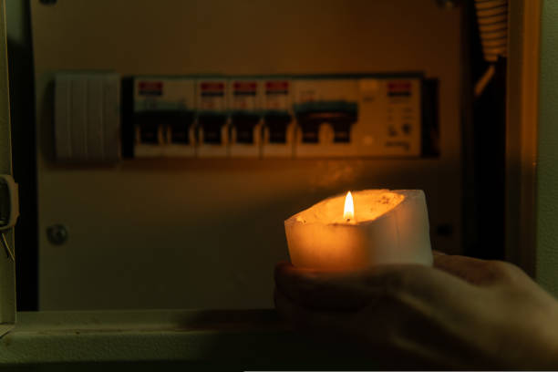 istock Box circuit darkness green shutdown off measure night outage, from, hand fix blackout 1435881707