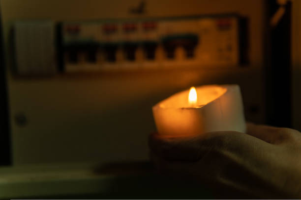 istock Box flame off shield dark wax repairman meter electricity, from, darkness 1435881826