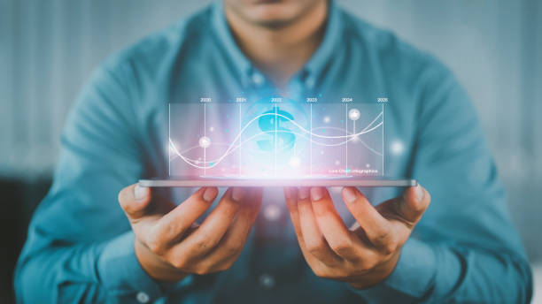 Businessman holding a smartphone to check business performance and metaverse world map with shopping online icon, paying money in the digital world, digital online concepts, line chart infographic. hombre de negocios sosteniendo un teléfono inteligente para verificar el rendimiento del negocio y el mapa del mundo metaverso con el icono de compras en línea, pagar dinero en el mundo digital, conceptos digitales en línea, infografía de gráfico de l