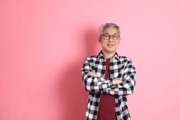 istock Asian Man on Pink 1435889506
