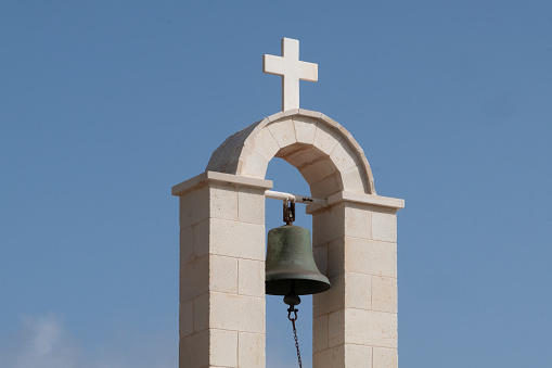 Historical bell tower of Igreja de Matriz in the old town village area of Albufeira in Portugal