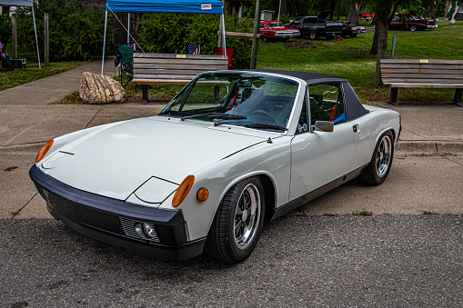 Des Moines, IA - July 01, 2022: High perspective front corner view of a 1974 Porsche 914 Targa Coupe  at a local car show.