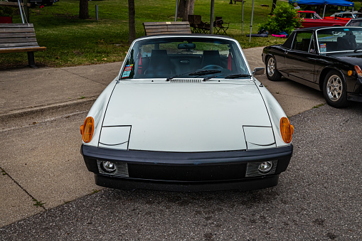 Des Moines, IA - July 01, 2022: High perspective front view of a 1974 Porsche 914 Targa Coupe at a local car show.
