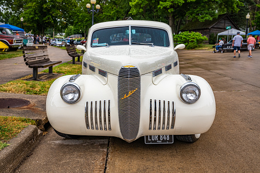Des Moines, IA - July 01, 2022: High perspective front view of a 1940 LaSalle Series 52 Club Coupe at a local car show.