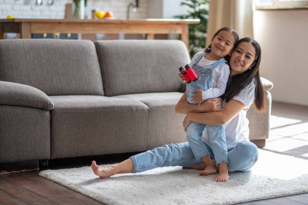 istock Loving young mother embracing her cute child 1435893205