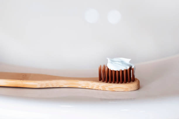 istock Wooden eco toothbrush with toothpaste. 1435894309
